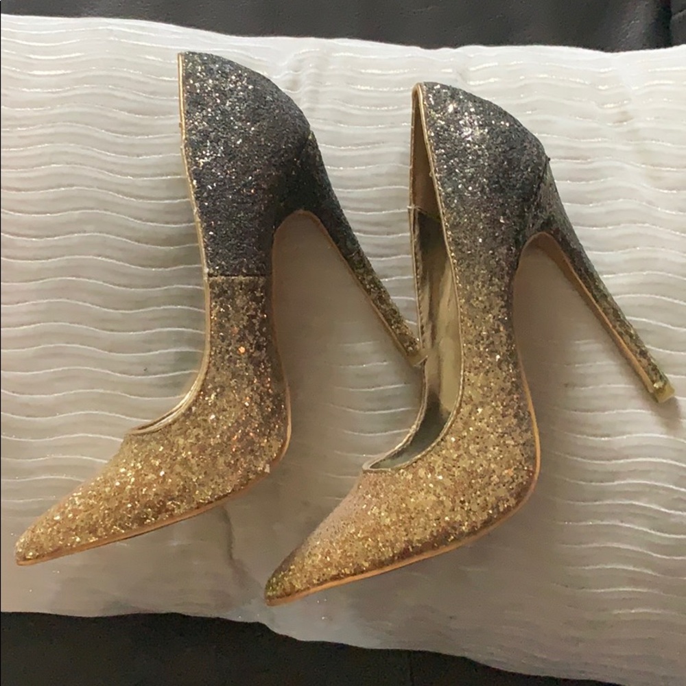 Gold and black Stilettos
